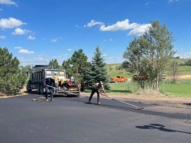 Asphalt paving crew in Colorado Springs